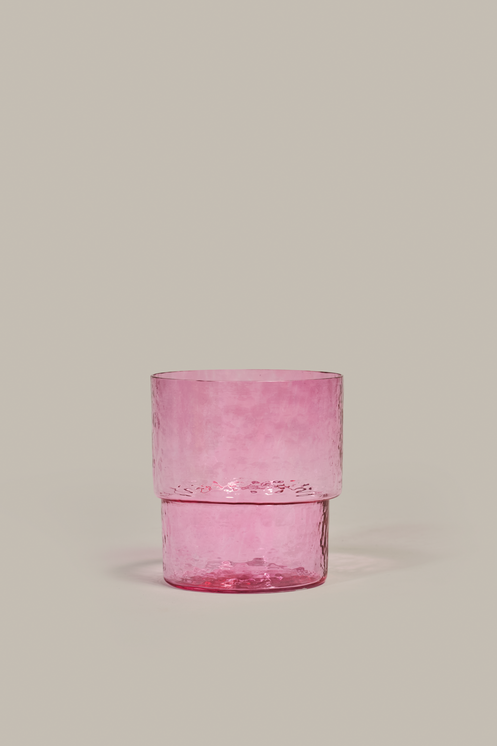 Handmade mouth-blown Pool glass in translucent pink by Cornelius Réer with ground rim finish