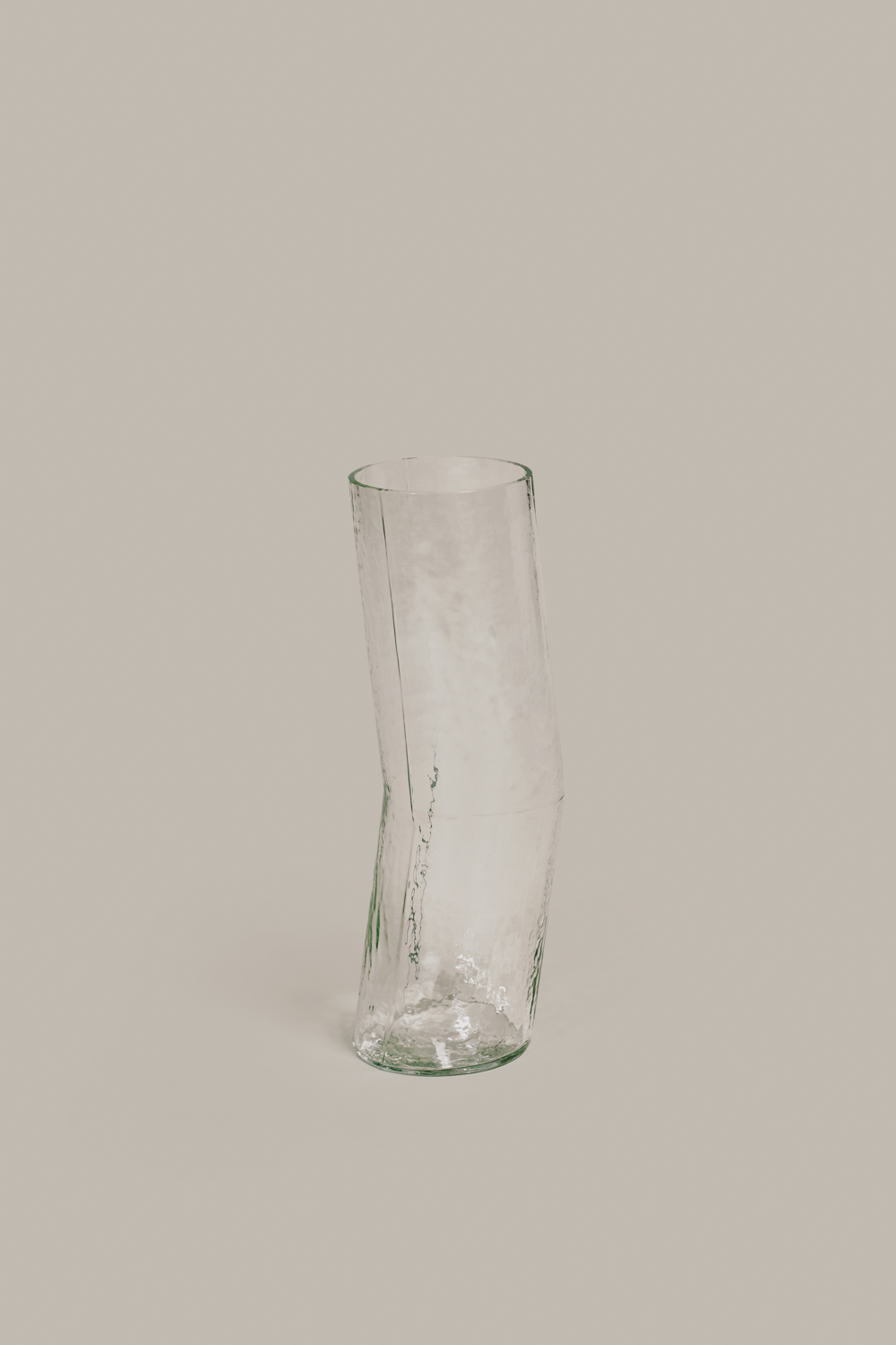 Mouth-blown light green Pool pitcher by Cornelius Réer with an asymmetrical angled profile and water-ripple texture